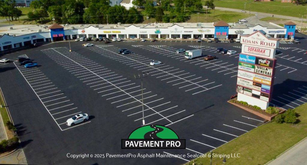 Aerial photo of parking lot with new sealcoating and striping