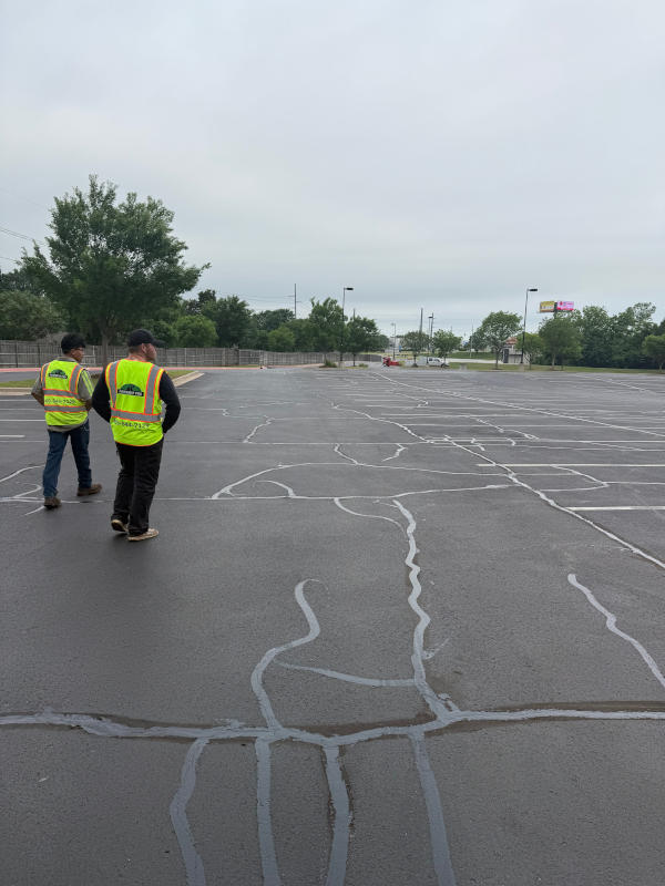 Crew inspecting parking lot at Life Church