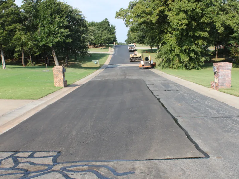 view of street Black Hawk RD  in Edmonds after asphalt repair has been completed. 