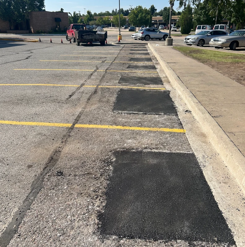 asphalt patches in a parking lot