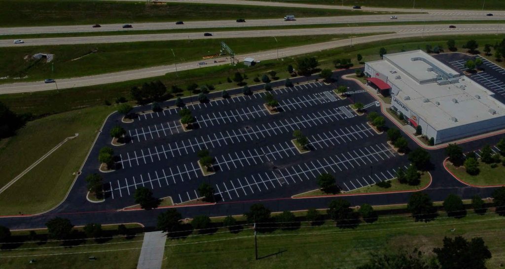 Parking lot with new sealcoating