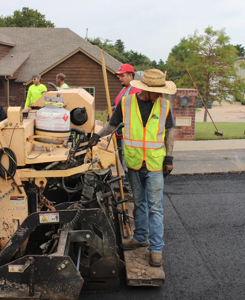 asphalt paver laying hot mix aspahlt