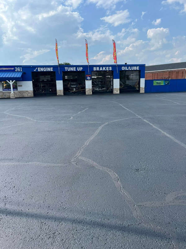 Quick oil change parking lot with new sealcoating
