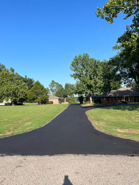 Long driveway with fresh sealcoating